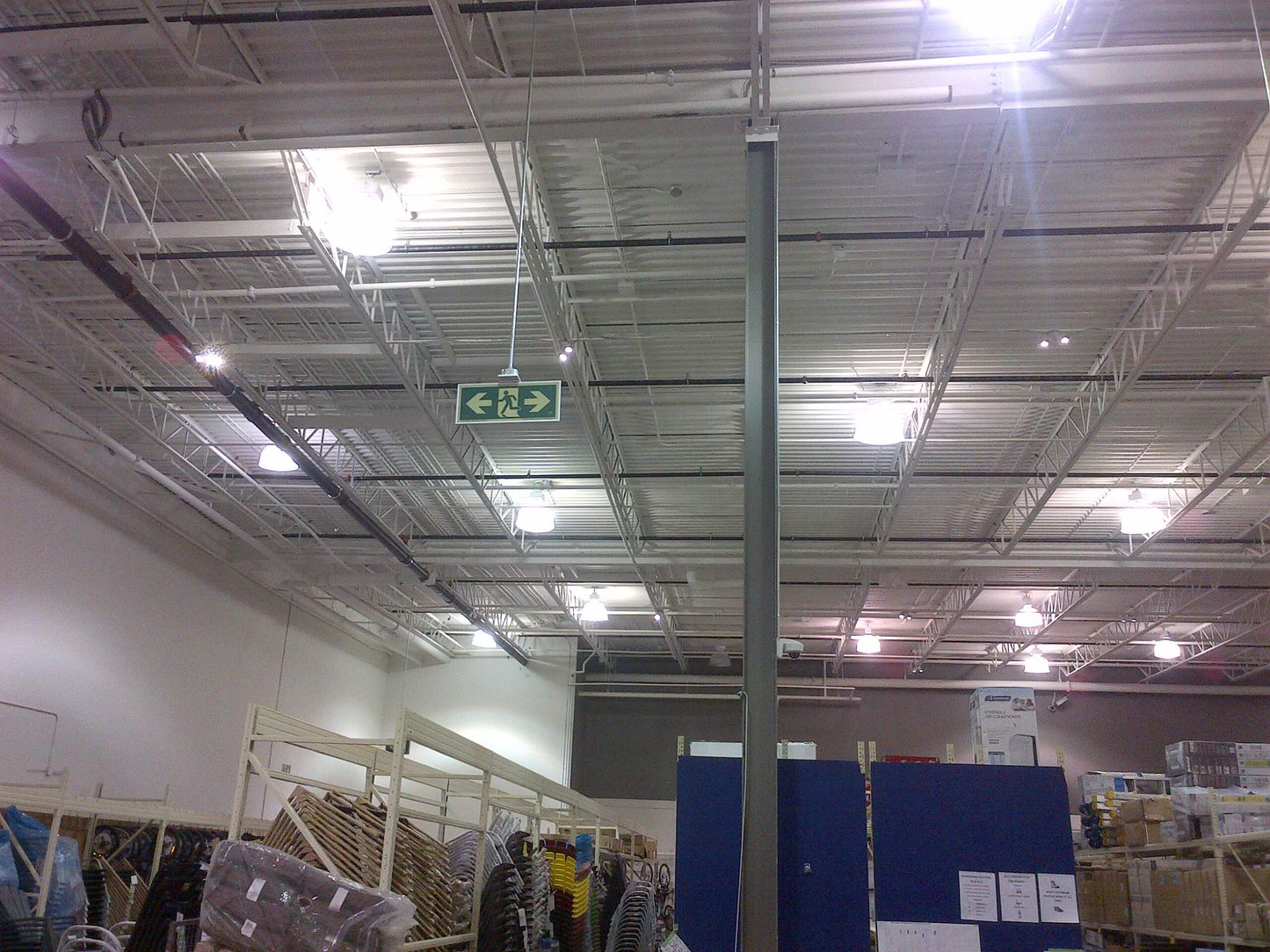 Door Mounted Pathmarking Sign. Running Man with Exit. 3M Double Sided Tape